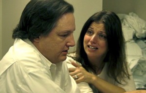 PAINFUL SCENE: Actors Kevin Bohl and Leslie Reagoso portrayed parents of a gravely ill basketball player during doctor training exercise at Morristown's Goryeb Children's Hospital. Photo by Kevin Coughlin