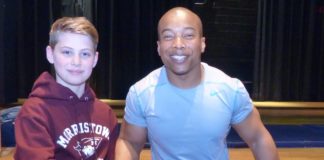 FMS wrestler Lucas Scheid with Rohan Murphy at Frelinghuysen Middle School, March 17, 2017. Photo by Kevin Coughlin