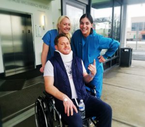 Eric Hayes with new fans, post-op. Photo courtesy of the singer.