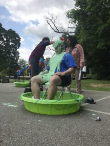 Sussex County School Principal Peter Frazzano gets 'slimed' by pupils for a reading contest. Photo courtesy of Christine Kelly.
