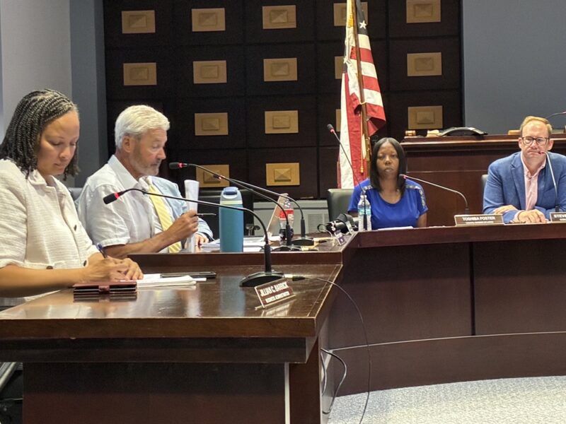 Mayor Tim Dougherty, second from left, reports on the Morristown Jazz & Blues Festival during the town council meeting Tuesday, Aug. 18.-2